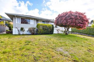 Photo 1: 4406 CANTERBURY Crescent in North Vancouver: Forest Hills NV House for sale : MLS®# R2881062