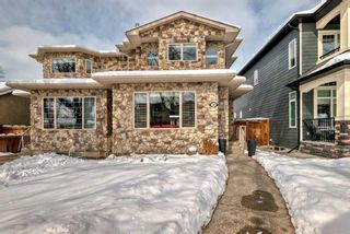 Main Photo: 330 18 Avenue NW in Calgary: Mount Pleasant Semi Detached (Half Duplex) for sale : MLS®# A2116608
