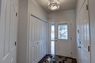 Photo 3: 113 Everwillow Close SW in Calgary: Evergreen Detached for sale : MLS®# A1169035