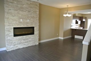 Photo 3: 2 13003 132 Avenue NW in Edmonton: Zone 01 Townhouse for sale : MLS®# E4273783
