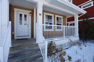 Photo 2: 86 Sunset Road: Cochrane Row/Townhouse for sale : MLS®# A2011794