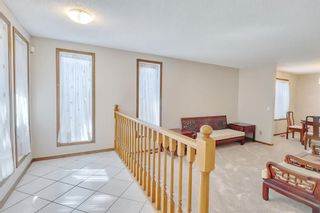Photo 4: 104 Sandstone Way NW in Calgary: Sandstone Valley Detached for sale : MLS®# A2051370