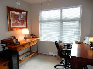 Photo 7: 411 500 KLAHANIE Drive in Port Moody: Port Moody Centre Condo for sale in "TIDES" : MLS®# R2025736