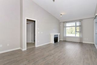 Photo 2: 305 23285 BILLY BROWN Road in Langley: Fort Langley Condo for sale in "The Village at Bedford Landing" : MLS®# R2211106