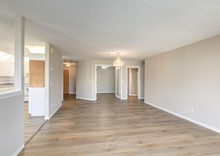 Photo 3: 326 7229 Sierra Morena Boulevard SW in Calgary: Signal Hill Apartment for sale : MLS®# A1147916