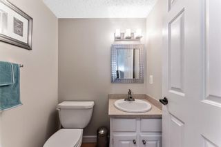 Photo 12: 108 Glamis Terrace SW in Calgary: Glamorgan Row/Townhouse for sale : MLS®# A1070053