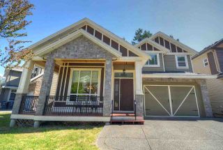 Photo 1: 5840 138 Street in Surrey: Panorama Ridge House for sale : MLS®# R2567744