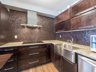 Photo 16: 360 Point Mckay Gardens NW in Calgary: Point McKay Row/Townhouse for sale : MLS®# A2019988