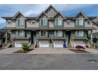 Photo 1: 59 6498 SOUTHDOWNE Place in Sardis: Sardis East Vedder Rd Townhouse for sale in "Village Green" : MLS®# R2059470