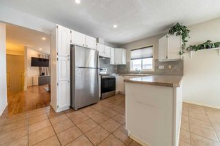 Photo 10: 14 Shawfield Place SW in Calgary: Shawnessy Detached for sale : MLS®# A2120201