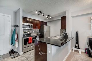 Photo 9: 8204 403 Mackenzie Way SW: Airdrie Apartment for sale : MLS®# A2081885