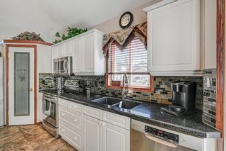 Photo 16: 91 Woodside Crescent NW: Airdrie Detached for sale : MLS®# A2049282