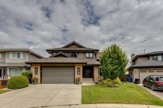 Photo 1: 48 Sunset Close SE in Calgary: Sundance Detached for sale : MLS®# A1243517