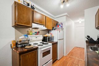 Photo 3: 101 1113 37 Street SW in Calgary: Rosscarrock Apartment for sale : MLS®# A2114867