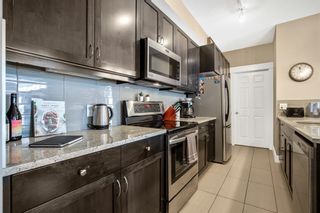 Photo 8: 109 201 20 Avenue NE in Calgary: Tuxedo Park Apartment for sale : MLS®# A2030971