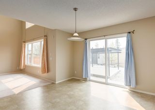 Photo 5: 148 Cougartown Close SW in Calgary: Cougar Ridge Detached for sale : MLS®# A2050763