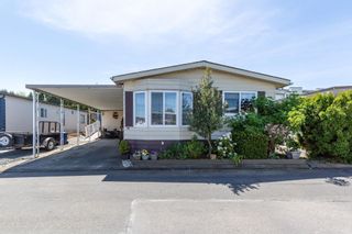 Main Photo: 30 8254 134 Street in Surrey: Queen Mary Park Surrey Manufactured Home for sale in "WESTWOOD ESTATES" : MLS®# R2861615