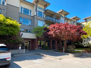Photo 1: 410 33539 HOLLAND Avenue in Abbotsford: Central Abbotsford Condo for sale in "THE CROSSING" : MLS®# R2862430