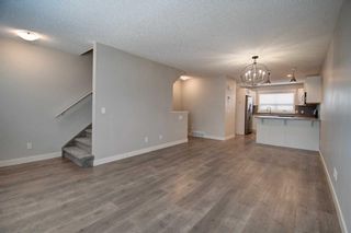 Photo 8: 802 2461 Baysprings Link SW: Airdrie Row/Townhouse for sale : MLS®# A2104532