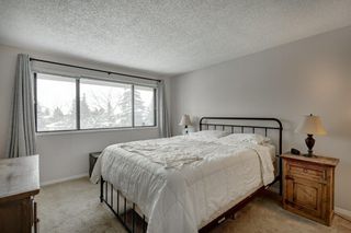 Photo 13: 143 Woodvale Bay SW in Calgary: Woodlands Row/Townhouse for sale : MLS®# A2022754