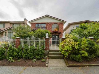 Photo 1: 2438 E 4TH Avenue in Vancouver: Renfrew VE House for sale in "RENFREW" (Vancouver East)  : MLS®# R2114530