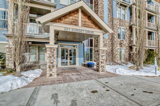 Photo 1: 405 201 Sunset Drive: Cochrane Apartment for sale : MLS®# A2029088