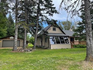 Photo 1: 42 Westshore Road in Gimli Rm: House for sale : MLS®# 202318012