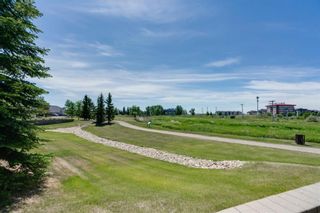 Photo 7: 319 305 1 Avenue NW: Airdrie Apartment for sale : MLS®# A1148151