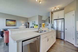 Photo 11: 115 Brightoncrest Terrace SE in Calgary: New Brighton Detached for sale : MLS®# A2120052