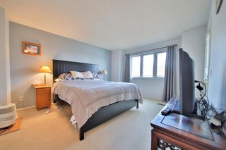 Photo 25: 10 388 Sandarac Drive NW in Calgary: Sandstone Valley Row/Townhouse for sale : MLS®# A1181075