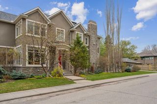 Photo 1: 720 22 Street NW in Calgary: West Hillhurst Semi Detached (Half Duplex) for sale : MLS®# A2121152