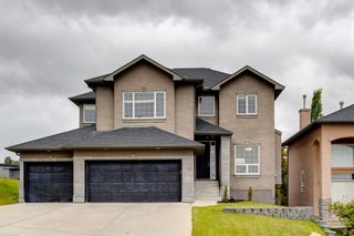 Photo 1: 7310 Elkton Drive SW in Calgary: Springbank Hill Detached for sale : MLS®# A1232709