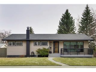 Main Photo: LONGMOOR WY SW in Calgary: Lakeview House for sale