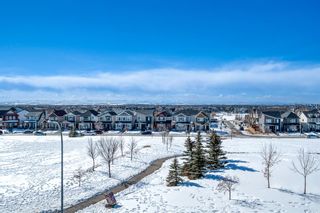 Photo 1: 6414 755 Copperpond Boulevard SE in Calgary: Copperfield Apartment for sale : MLS®# A2034672