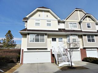 Photo 1: 123 Tuscany Springs Gardens NW in Calgary: Tuscany Row/Townhouse for sale : MLS®# A1189424