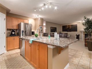 Photo 7: 40 COUGARSTONE Manor SW in Calgary: Cougar Ridge House for sale : MLS®# C4087798