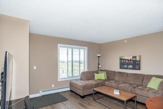 Photo 5: 6407 403 Mackenzie Way SW: Airdrie Apartment for sale : MLS®# A2049267