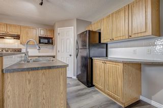 Photo 12: 52 COUGARSTONE Villa SW in Calgary: Cougar Ridge Detached for sale : MLS®# A1020063