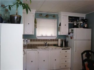 Photo 4: 67 201 CAYER Street in Coquitlam: Maillardville Manufactured Home for sale in "WILDWOOD PARK" : MLS®# V1002257