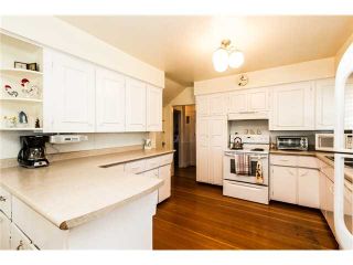 Photo 6: 327 ARBUTUS Street in New Westminster: Queens Park House for sale in "QUEENS PARK" : MLS®# V1081789