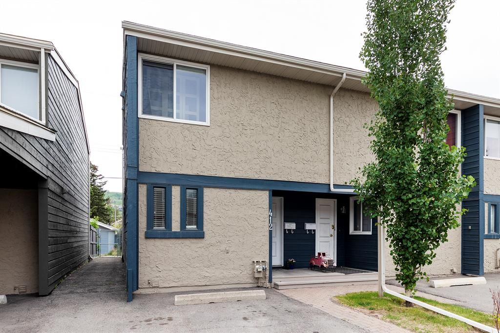 Main Photo: 412 6223 31 Avenue NW in Calgary: Bowness Row/Townhouse for sale : MLS®# A2054300