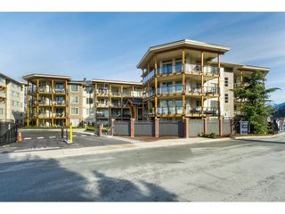 Photo 1: 404 45746 KEITH WILSON Road in Chilliwack: Sardis West Vedder Rd Condo for sale in "ENGLEWOOD COURTYARD- Platinum 2" (Sardis)  : MLS®# R2678854