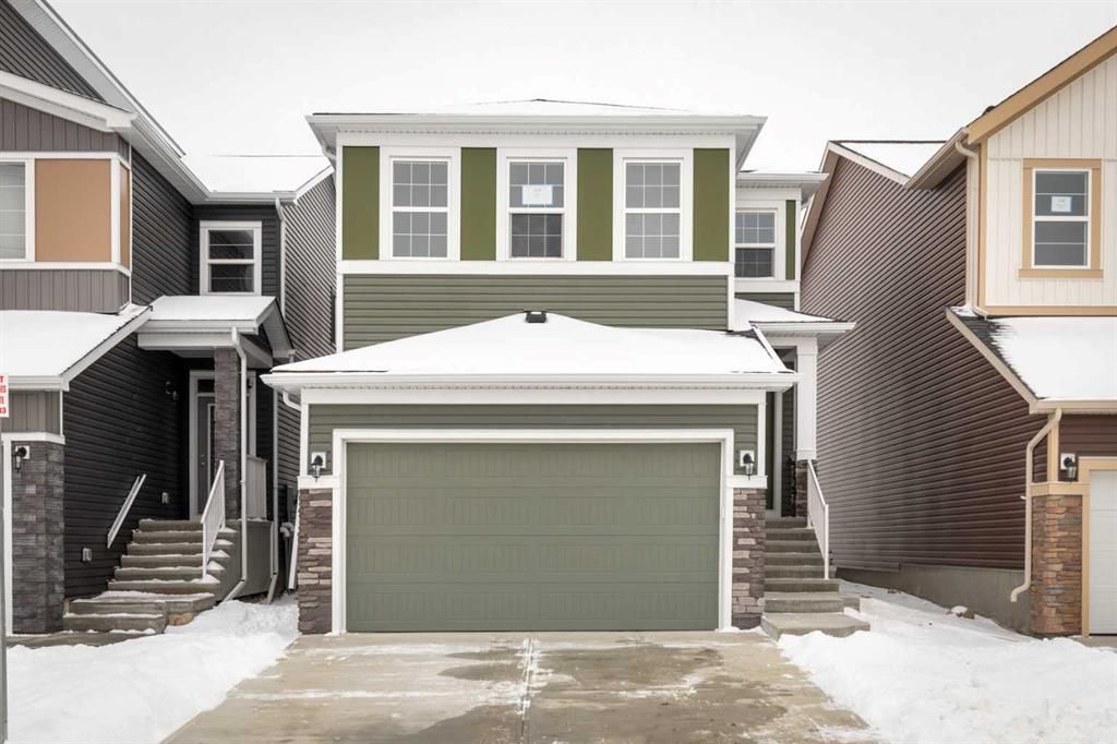 Main Photo: 114 Amblehurst Way NW in Calgary: C-527 Detached for sale : MLS®# A2106882