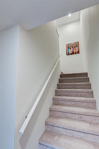 Photo 19: 507 Crestridge Common SW in Calgary: Crestmont Row/Townhouse for sale : MLS®# A1231684