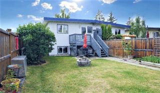 Photo 3: 7602 39 Avenue NW in Calgary: Bowness Semi Detached for sale : MLS®# A1033012