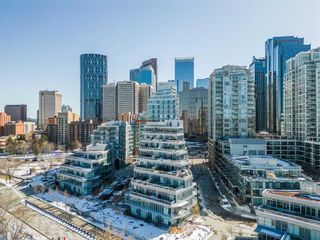Main Photo: 207 138 Waterfront Court SW in Calgary: Chinatown Apartment for sale : MLS®# A2118545