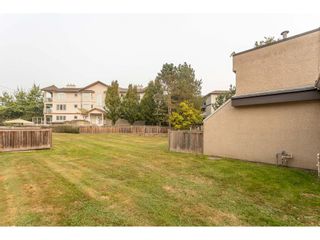 Photo 17: 102 17718 60 Avenue in Surrey: Cloverdale BC Townhouse for sale in "CLOVER PARK GARDENS" (Cloverdale)  : MLS®# R2498057