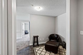 Photo 3: 4101 403 Mackenzie Way SW: Airdrie Apartment for sale : MLS®# A1242343