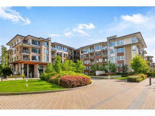 Photo 1: 312 1152 WINDSOR Mews in Coquitlam: New Horizons Condo for sale in "Parker House East" : MLS®# R2649963
