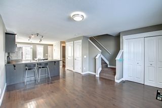 Photo 5: 204 CASCADES Passage: Chestermere Row/Townhouse for sale : MLS®# A1189058